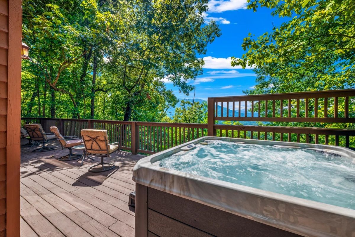 Hot tub on a deck with beautiful views of the Smoky Mountains